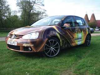 Car wrapped with vinyl graphics.